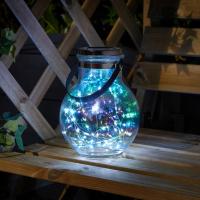 Lampe lanterne solaire Opal en verre iris avec filament de 50 leds             