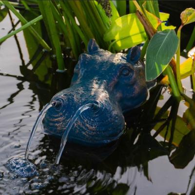 Hippopotame flottant cracheur d'eau                                             