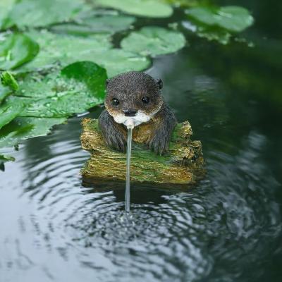 Sujet cracheur Loutre L 21cm x H 19cm                                           
